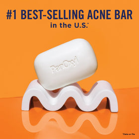 PanOxyl Acne Bar in use at a bathroom sink