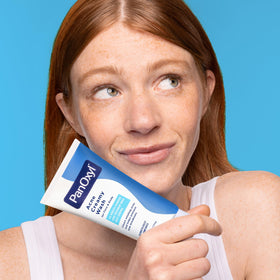 PanOxyl Acne Creamy Wash in a bathroom setting