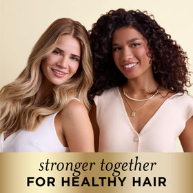 Pantene Shampoo & Conditioner Set Smooth & Sleek in use during a shower