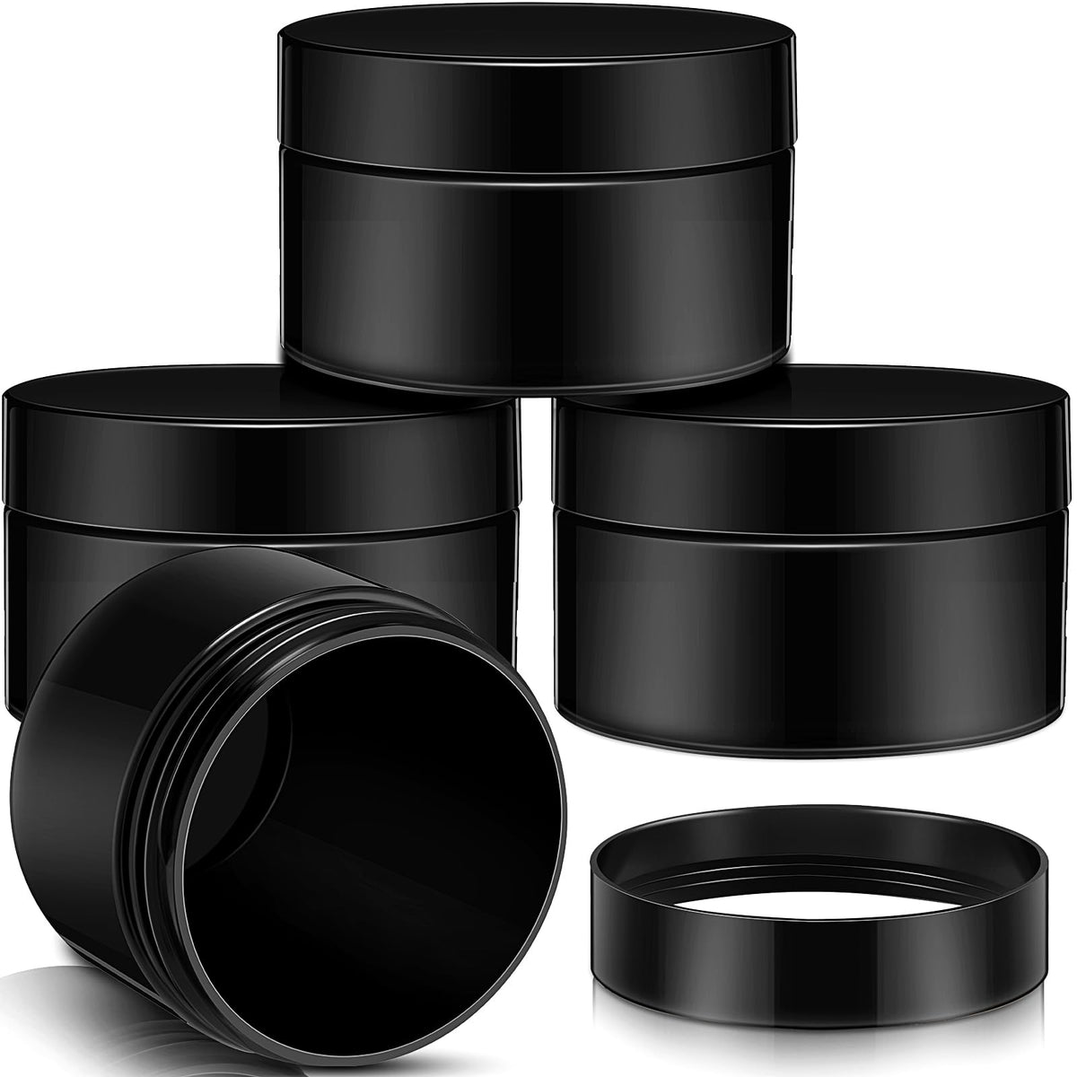 Patelai 4 round plastic jars with black lids, front view