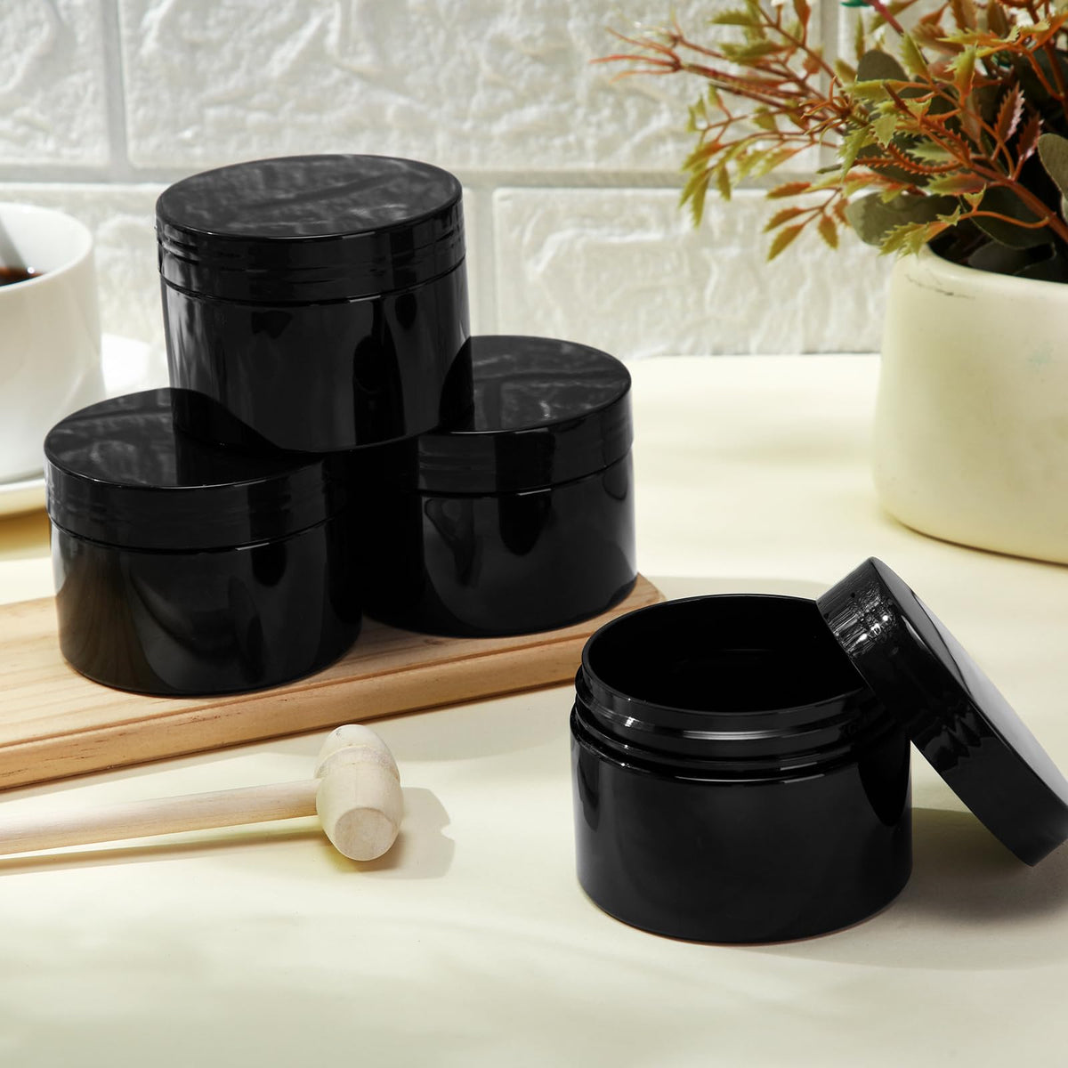 Patelai jars displayed with beauty products