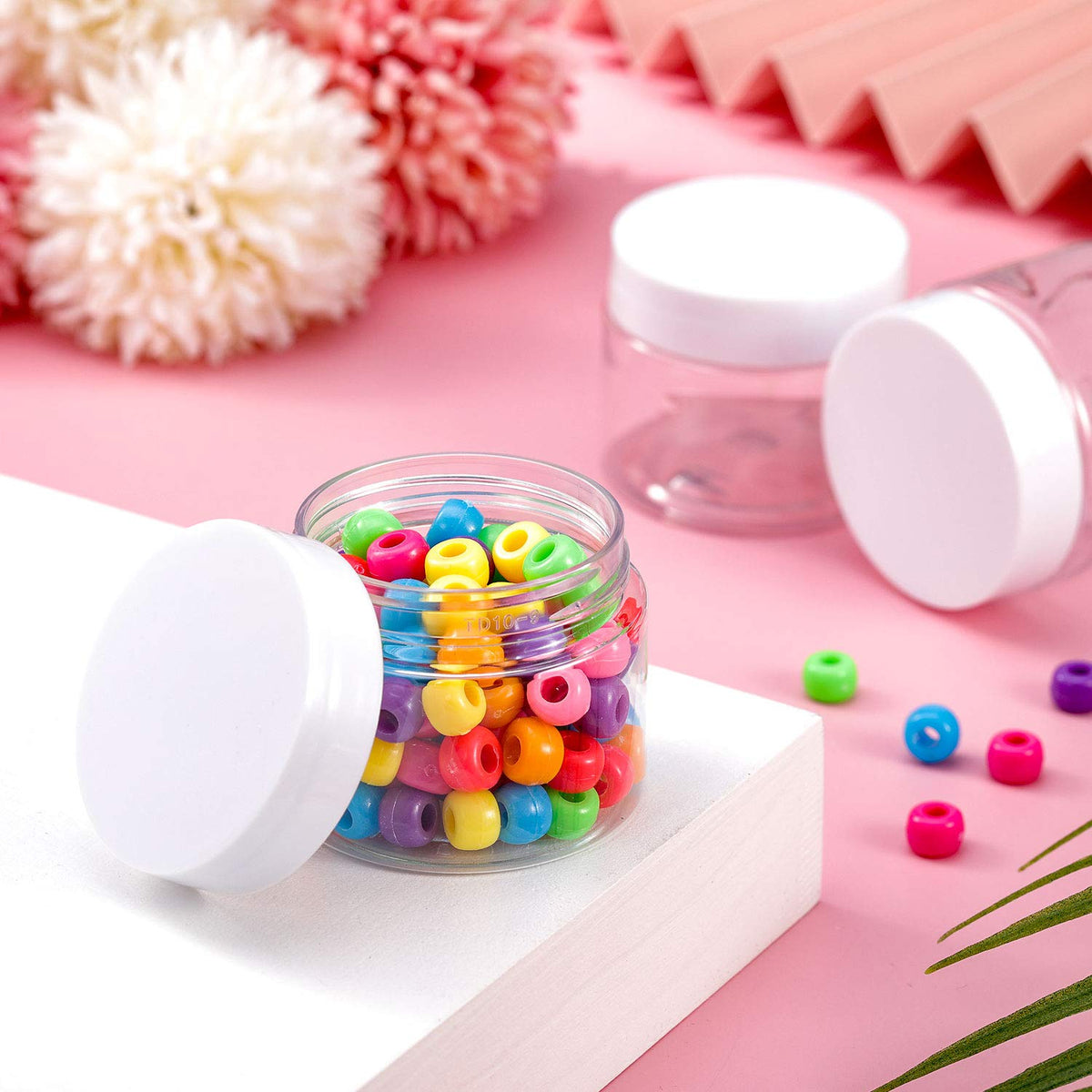 Patelai jars with various beauty products around