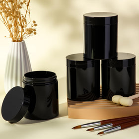 Patelai plastic jar with black lid against a white background