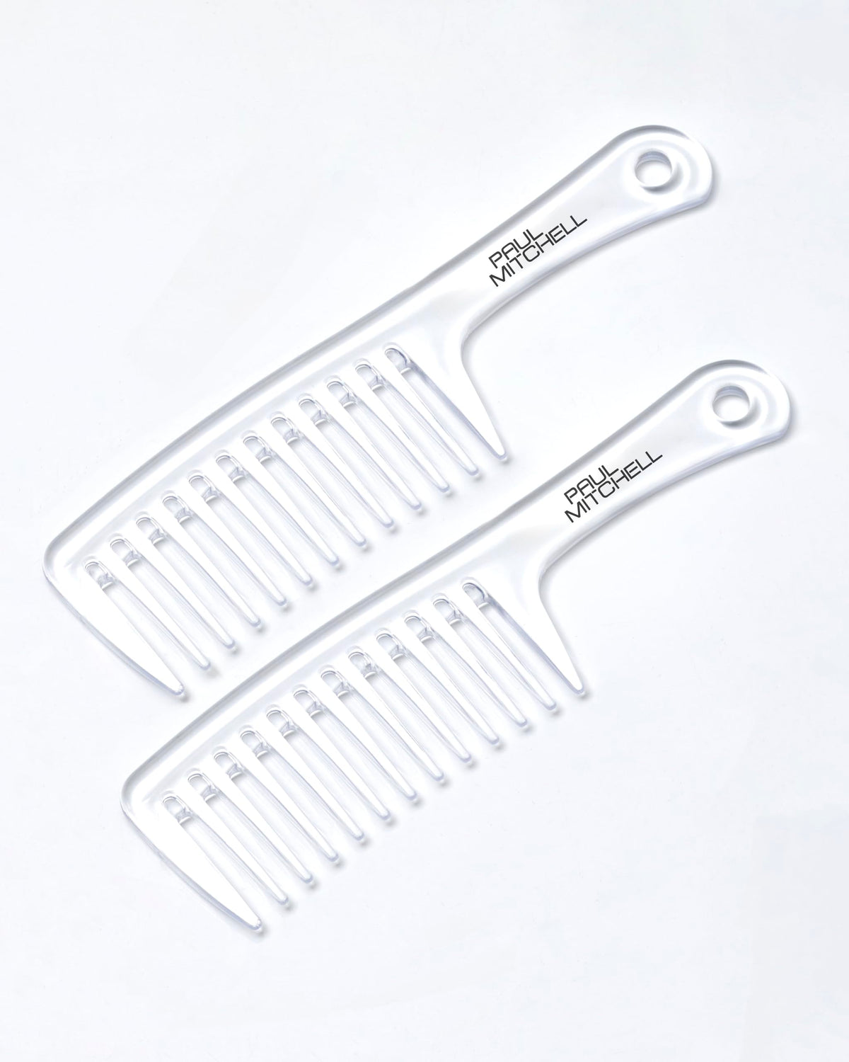 Paul Mitchell Detangler Comb in a lifestyle setting on a bathroom counter
