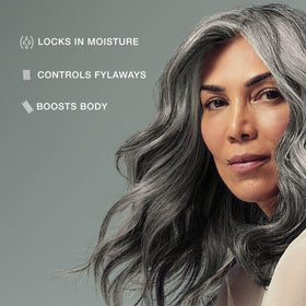 Paul Mitchell Extra-Body Sculpting Foam 16.9 oz application on hair