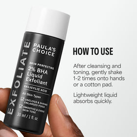 Paula's Choice Skin Perfecting 2% BHA Liquid Exfoliant 1oz on a flat surface