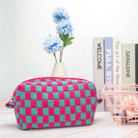 PAZIMIIK Checkered Makeup Bag compact size next to a purse