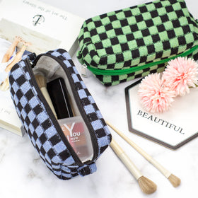 PAZIMIIK Checkered Makeup Bag styled with cosmetics