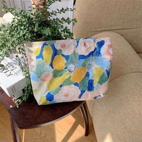 PAZIMIIK Flat Makeup Bag Garden Blue on a table