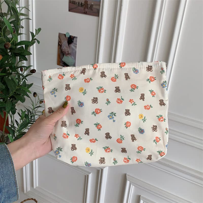 PAZIMIIK Flat Makeup Bag on a desk with beauty products