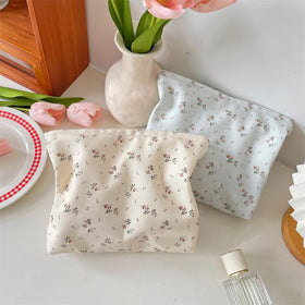 PAZIMIIK Flat Makeup Bag on a desk with skincare products