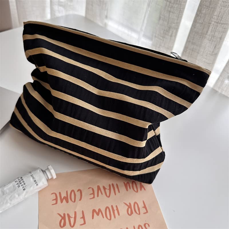 PAZIMIIK Flat Makeup Bag on a table with beauty products