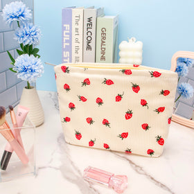 PAZIMIIK Flat Makeup Bag on a table with beauty products