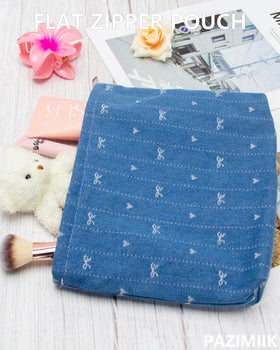 PAZIMIIK Flat Makeup Bag with various beauty products
