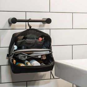 Peak Design Wash Pouch displayed on a bathroom counter
