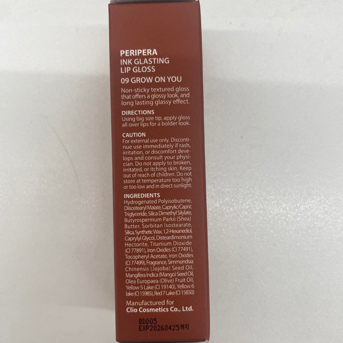 Peripera Ink Glasting Lip Gloss top view showing wand
