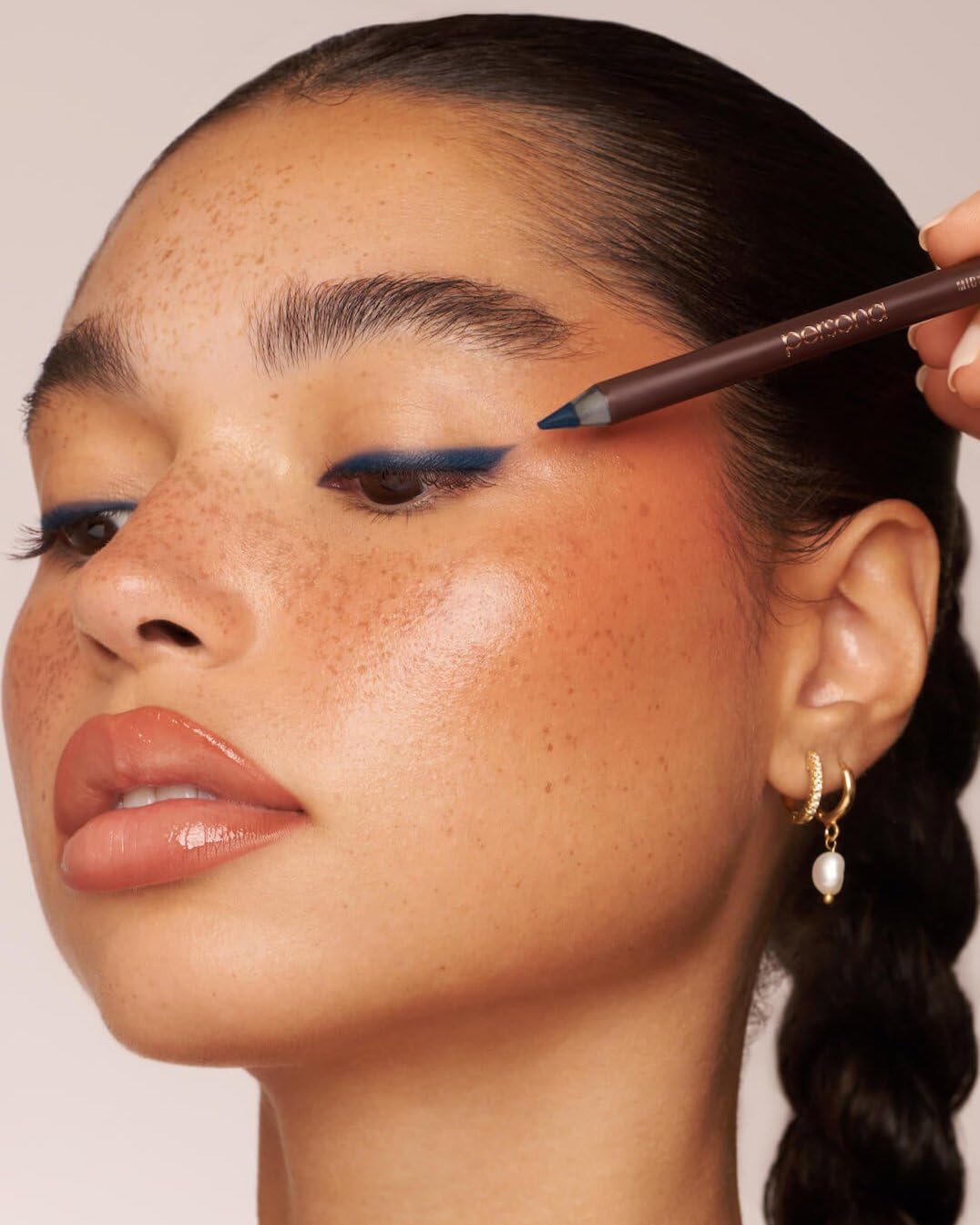PERSONA 24HR Waterproof Eyeliner Pencil in use on model