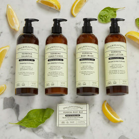 Pharmacopia Verbena Body Lotion on a bathroom shelf