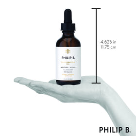 PHILIP B Rejuvenating Oil 60ml lifestyle scene with hair care products
