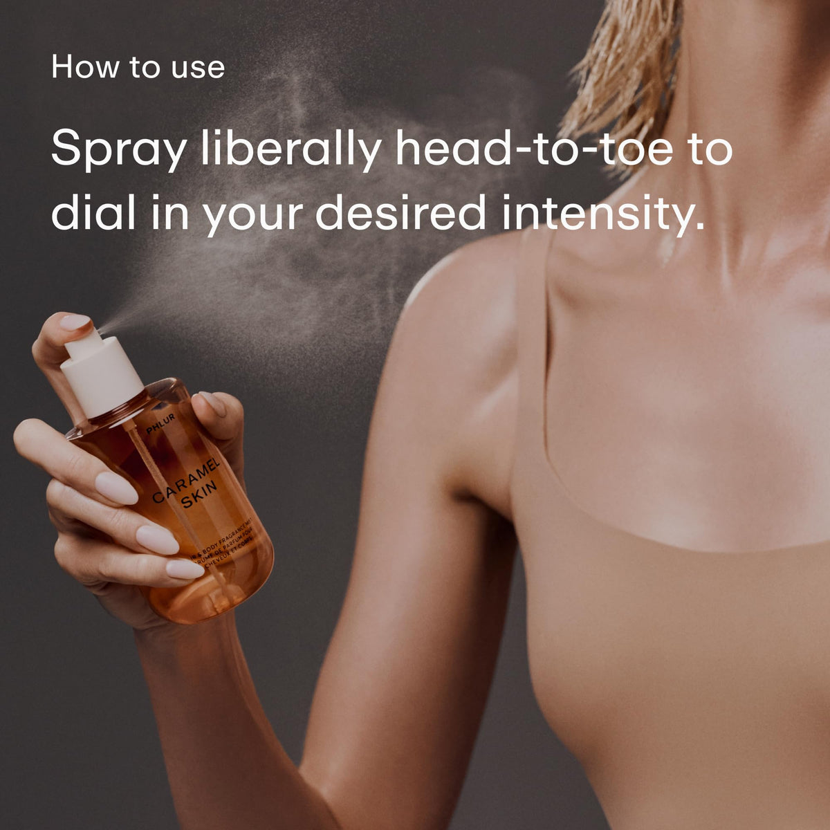 PHLUR Caramel Skin Body Mist misting on skin