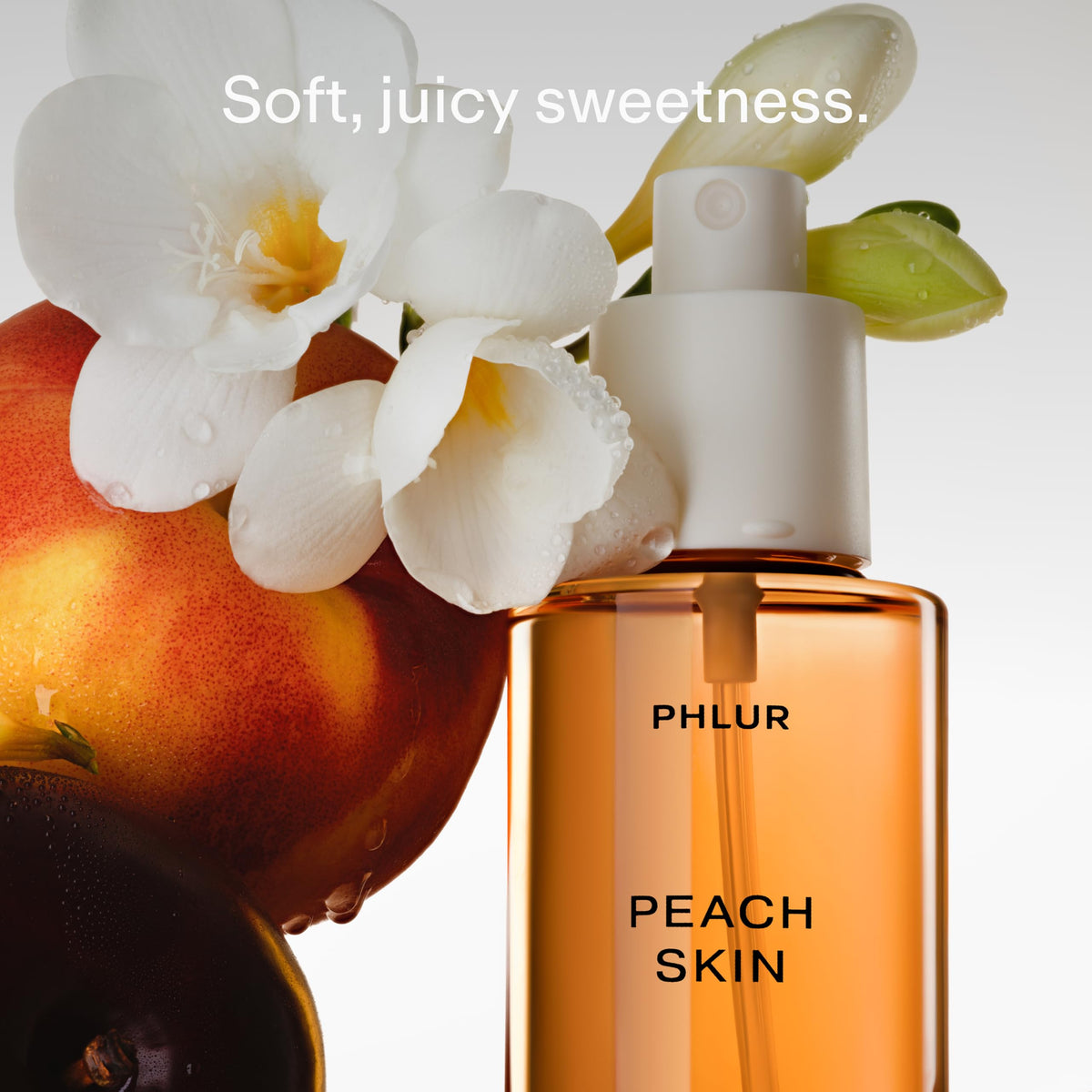 PHLUR Peach Skin Body Mist bottle side view