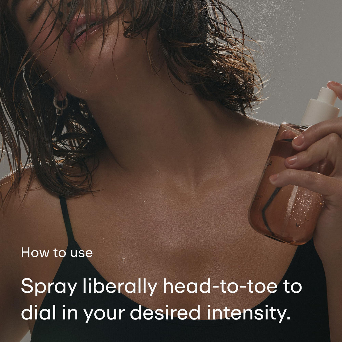 PHLUR Vanilla Skin Body Mist on a vanity