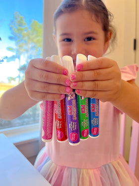Piggy Paint Nail Polish Pens packaging with multiple colours