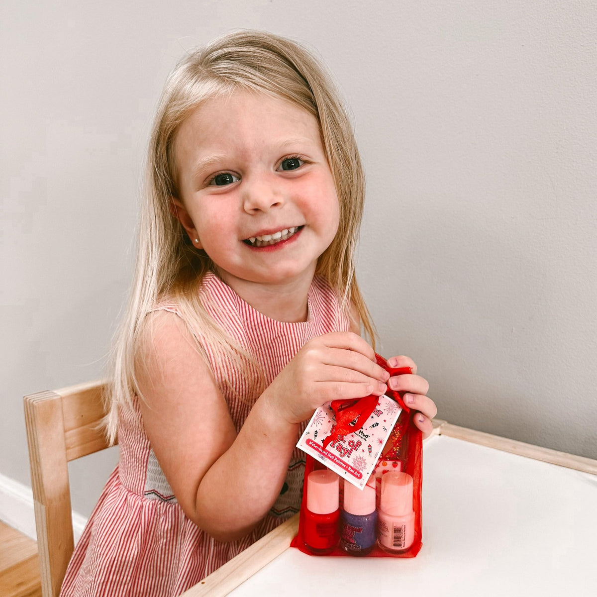 Piggy Paint nail polish with a hair dryer for drying nails