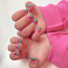 Piggy Paint Shimmery Pink Nail Polish bottle with basecoat and topcoat