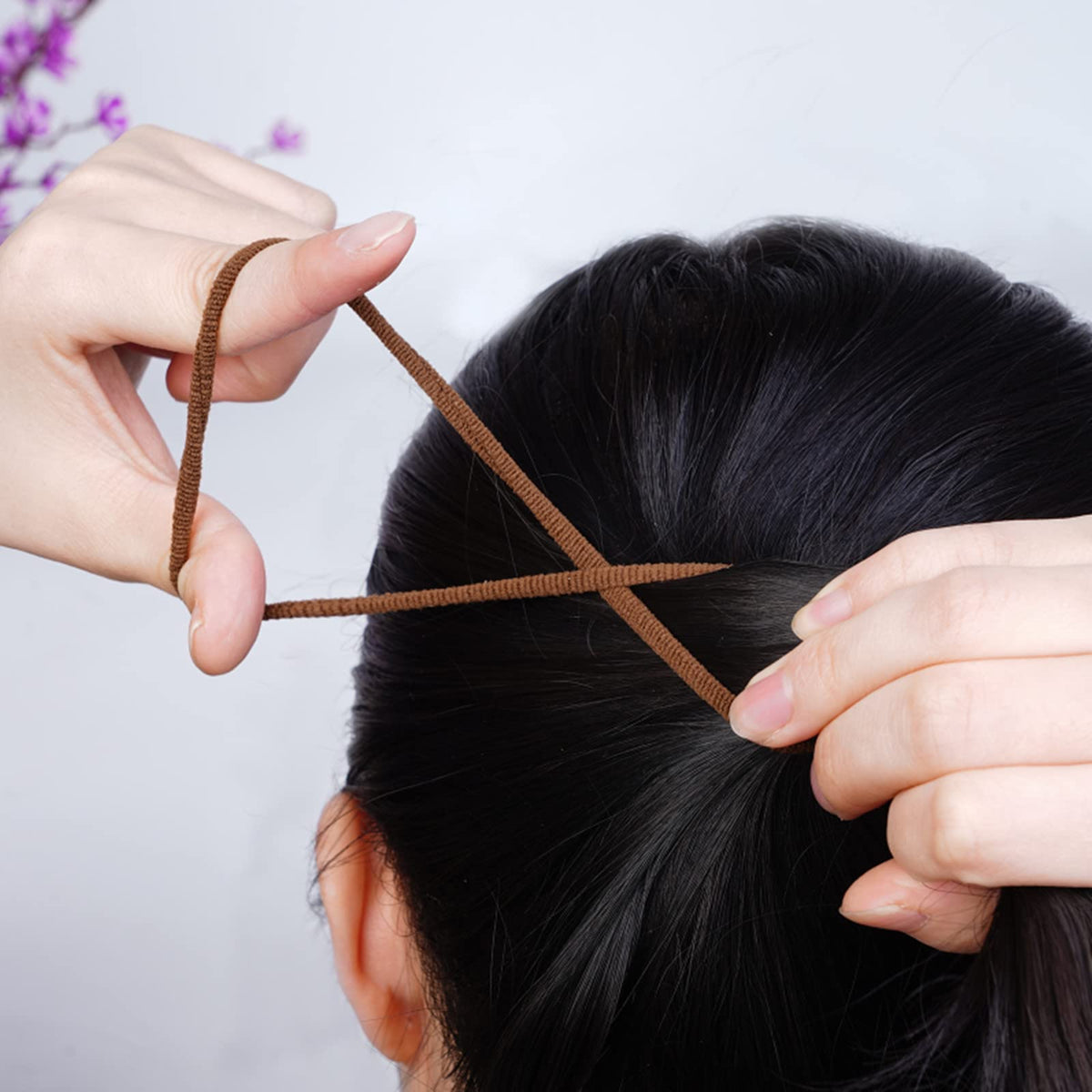 Pimoys Elastic Hair Ties in use on a ponytail