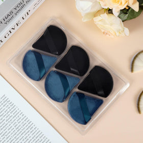 Pimoys makeup puffs displayed on a vanity
