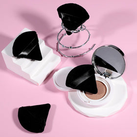 Pimoys Powder Puff showing triangle side for contour application