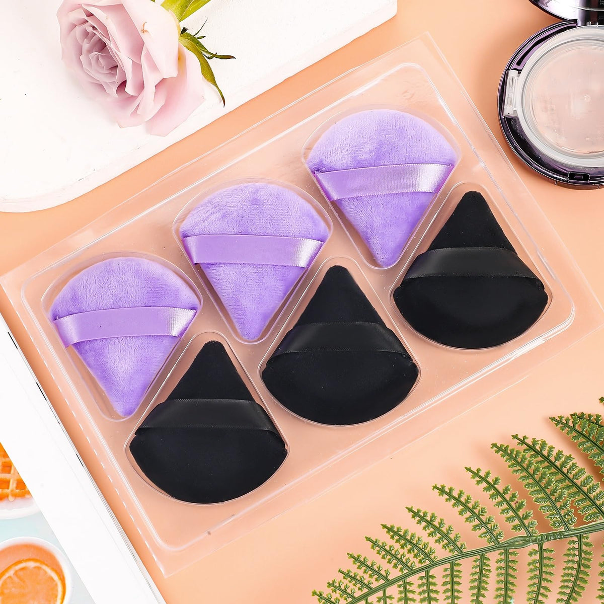 Pimoys powder puffs displayed with packaging