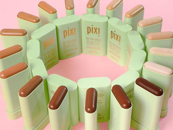 Pixi On-the-Glow Base Tinted Moisturizer Stick in hand