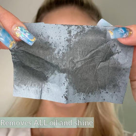 PleasingCare Large Face Oil Blotting Sheets being used outdoors