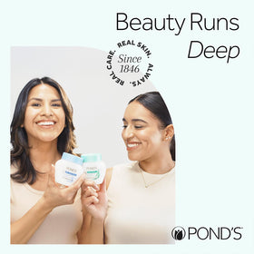 POND'S Dry Skin Cream texture on fingertip