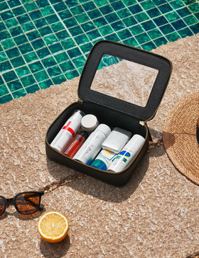 Popvibe Clear Toiletry Bag set displayed with travel essentials