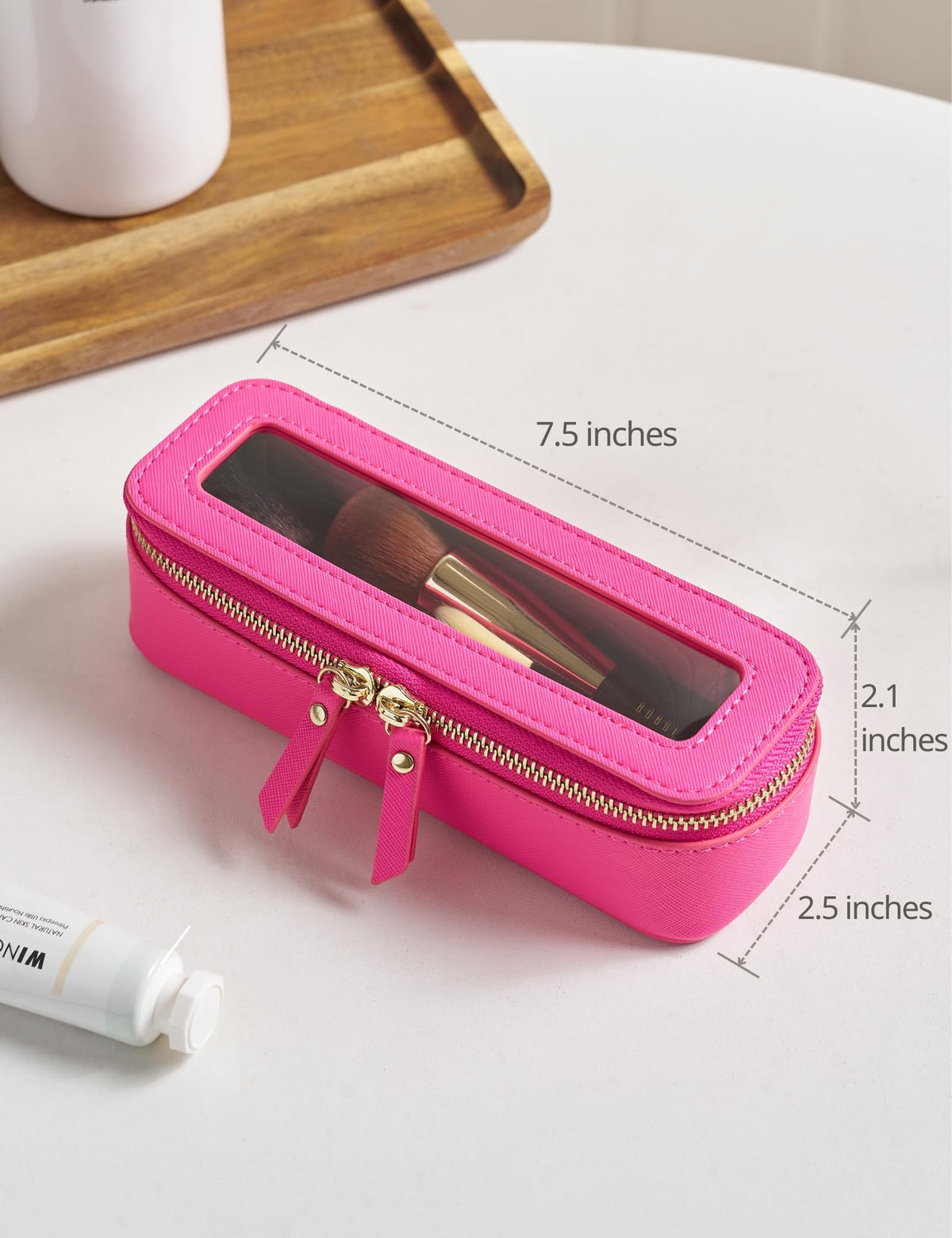 Popvibe Slim Makeup Brush Bag displayed on a vanity with cosmetics