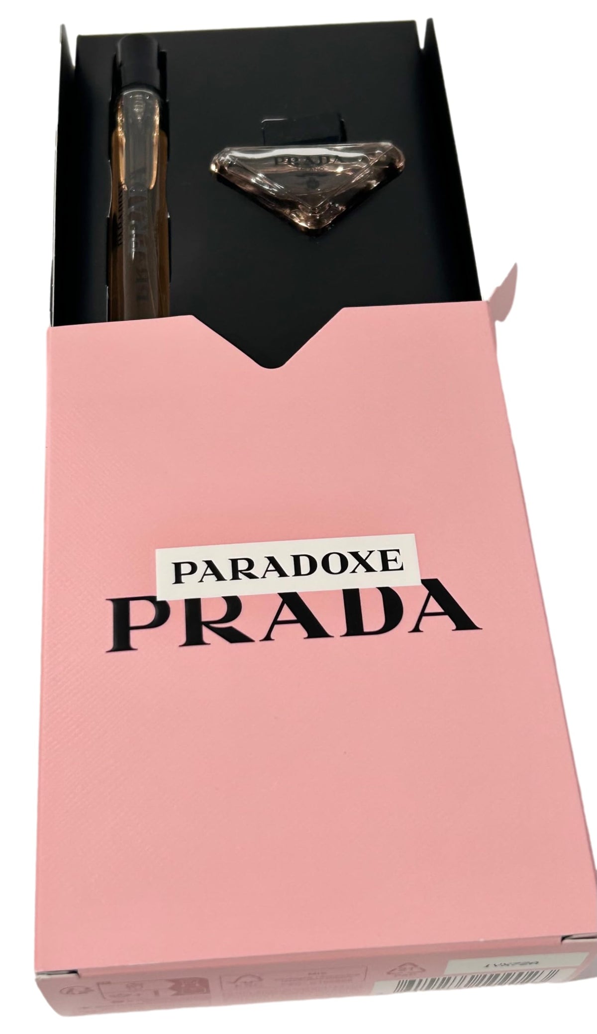 Prada Mini Paradoxe 10 ml Travel Spray in a handbag