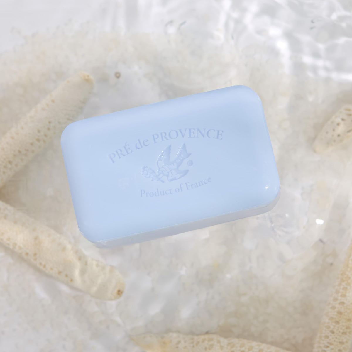 Pre de Provence Artisanal Soap Bar Ocean Air Scent with decorative background