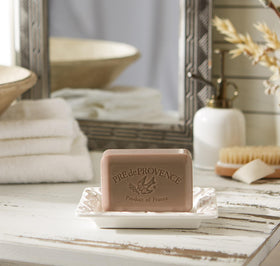 Pre de Provence Patchouli soap bar on a bathroom sink