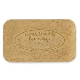 Pre de Provence soap bar on a wooden soap dish