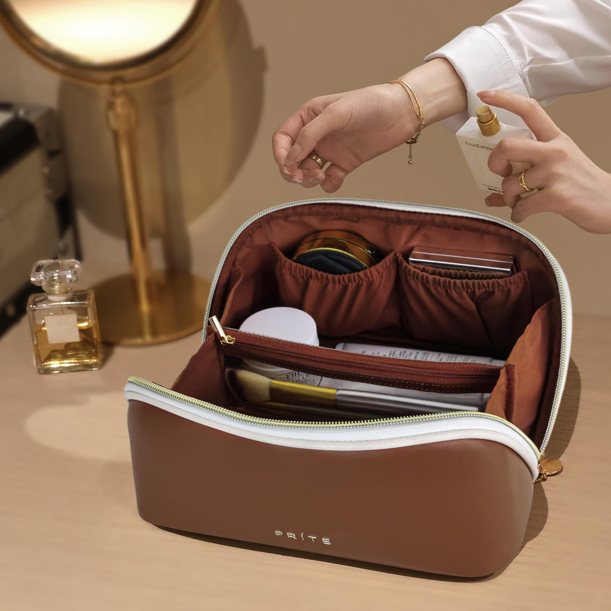 Prite Makeup Bag displayed with beauty accessories