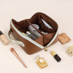 Prite Makeup Bag in travel setting with luggage