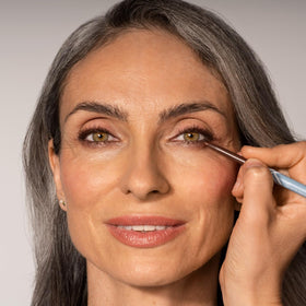 PROMETICS PrimeEyes Glide Eyeliner Mocha Shimmer being applied