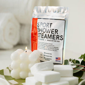 Pure Athlete shower steamer tablet dissolving in water