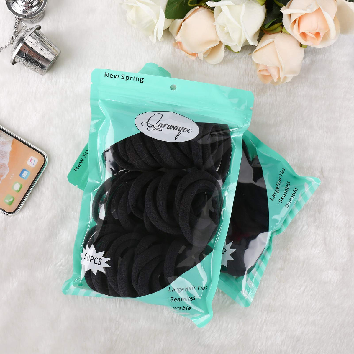 Qarwayoc hair ties in a pearly bag packaging