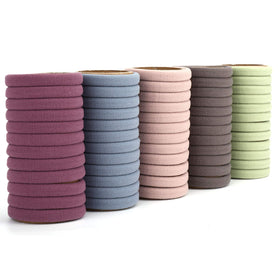 Qarwayoc hair ties in use on thick hair