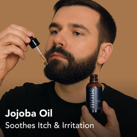 quality Mane Beard Care Oil being applied to beard