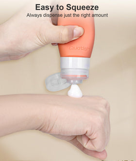Quatish silicone travel bottles with cap open for dispensing